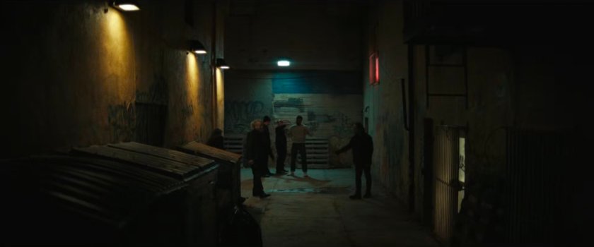 Patrick and his thugs threatening Trevor and Simon in the alley outside the bar.
