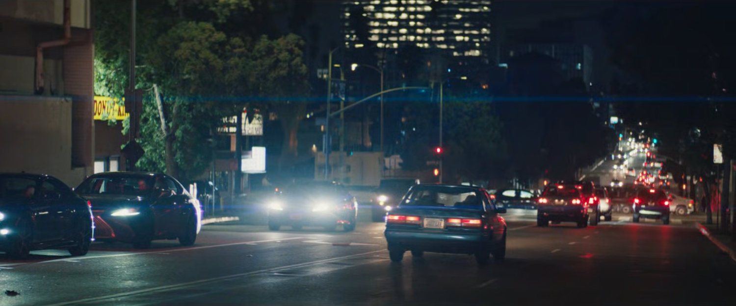 Simon's car driving along a street after losing Jayden.
