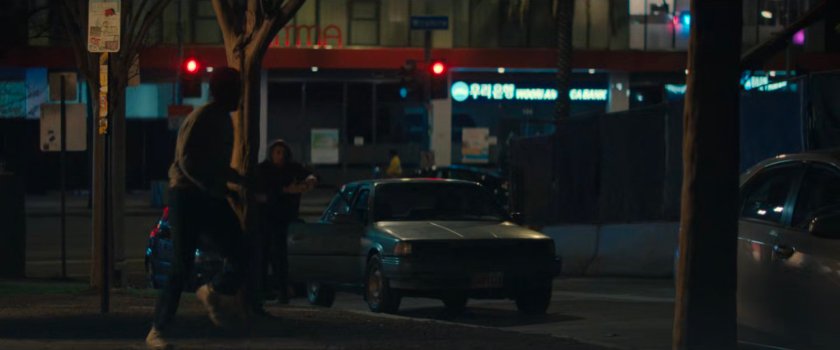 Simon and Trevor run from their car to Jayden.