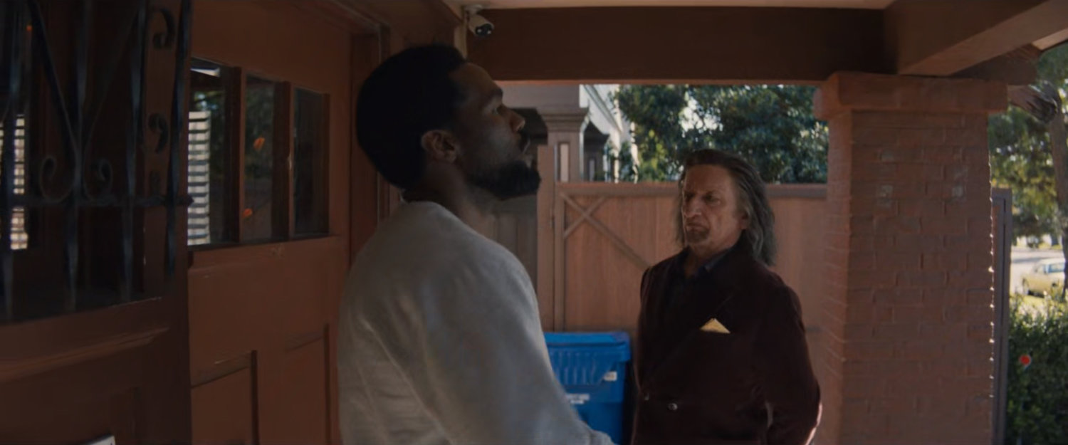 Trevor and Simon outside Esteban's house.