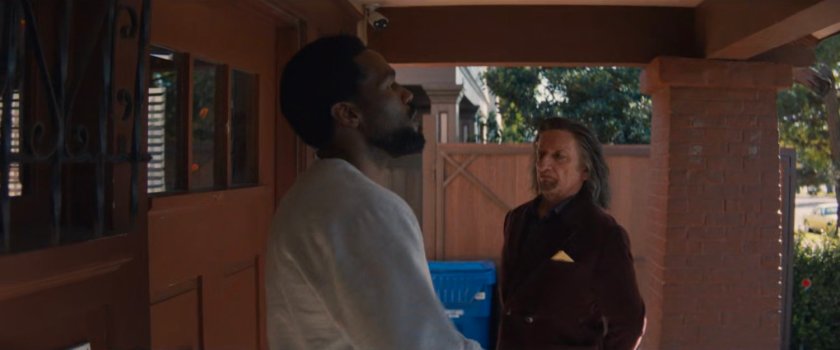 Trevor and Simon outside Esteban's house.