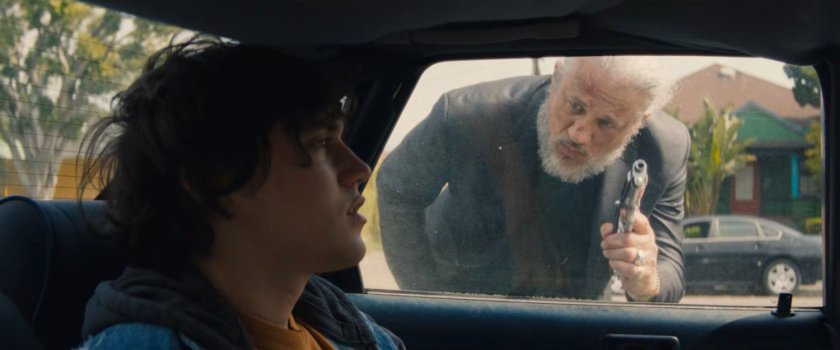 Patrick taps on the car window outside Esteban's house scaring Jayden.