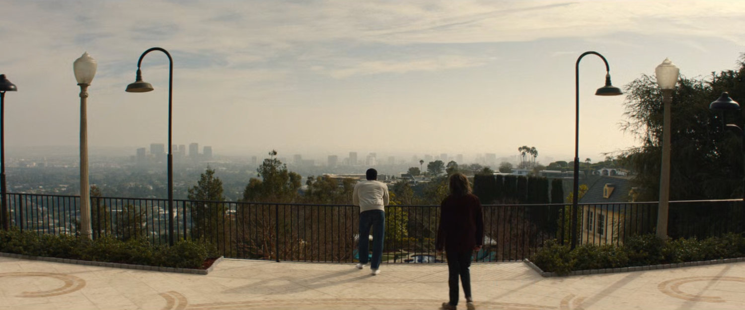 Simon and Trevor on the back patio of Von Kovak's mansion, overlooking Los Angeles.