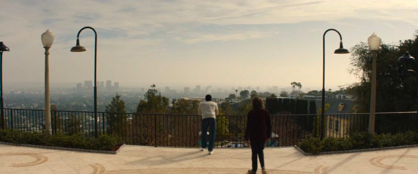 Simon and Trevor on the back patio of Von Kovac's mansion, overlooking Los Angeles.