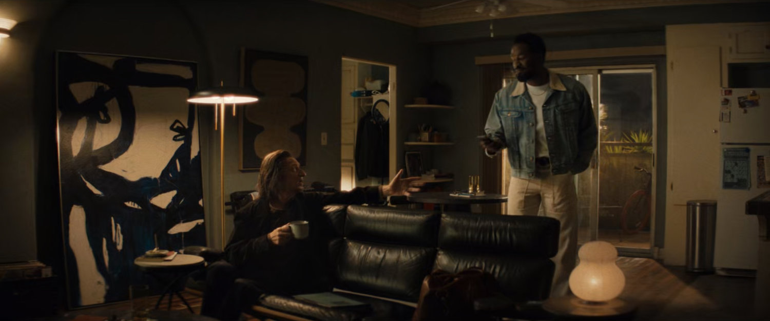 Trevor and Simon in his apartment.