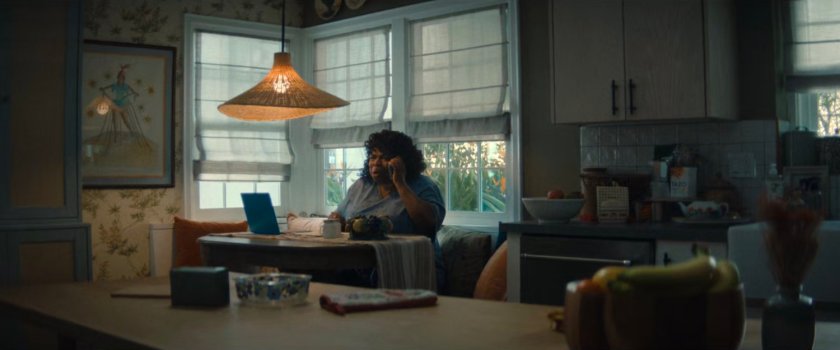 Martha on the phone in the Williams family kitchen.