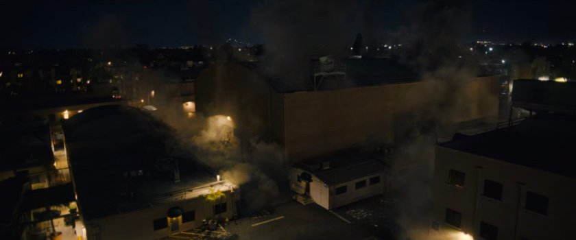 Aerial footage of explosion on studio soundstage.