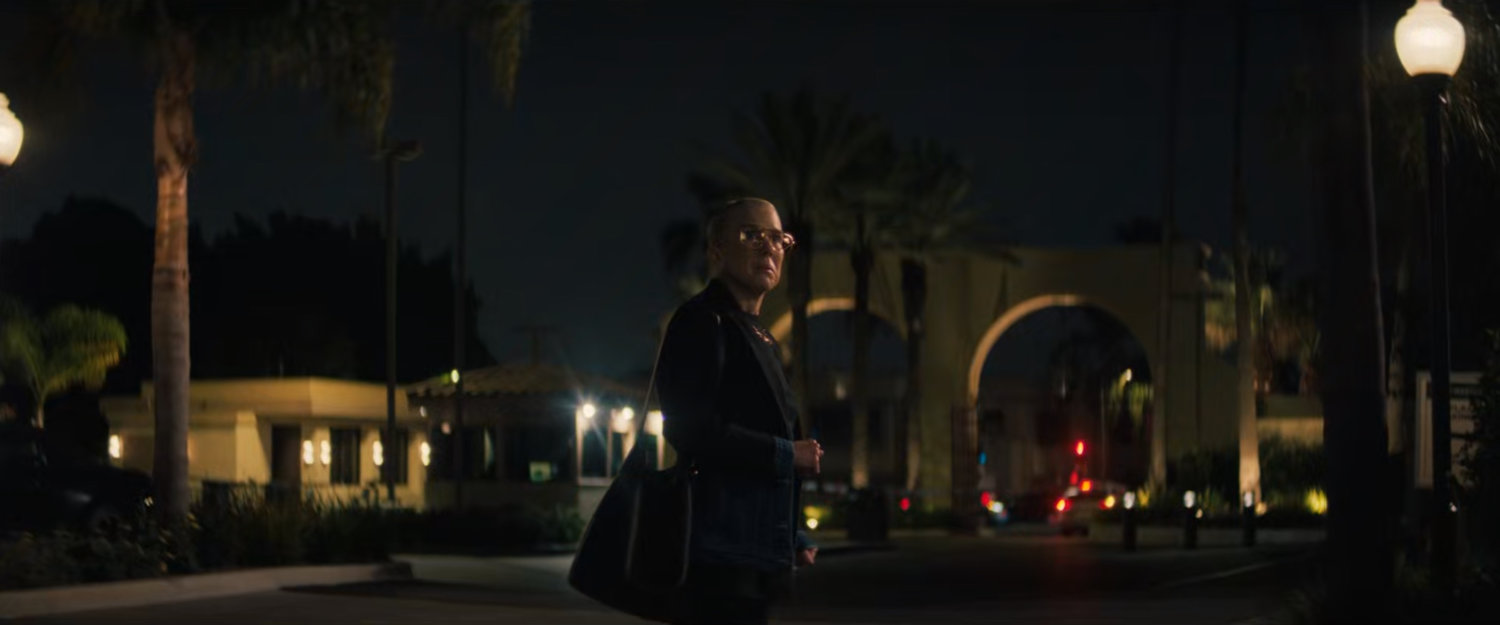Kathy at the front of the studio lot, looking back at the explosion.
