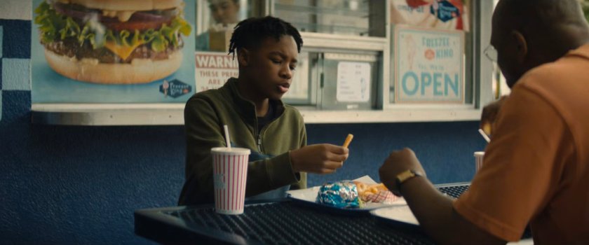 Young Simon and Sanford enjoy food at Freezee King.