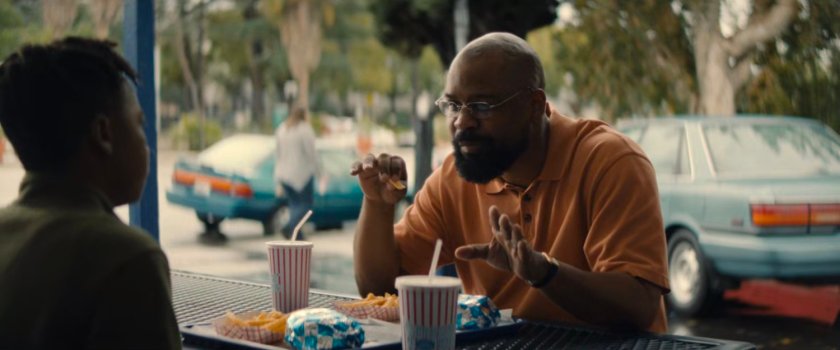 Young Simon and Sanford enjoy food at Freezee King.