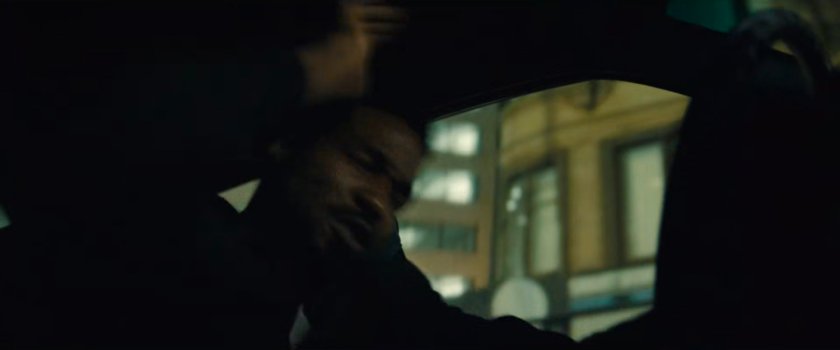 Simon driving his car around town at nighttime.