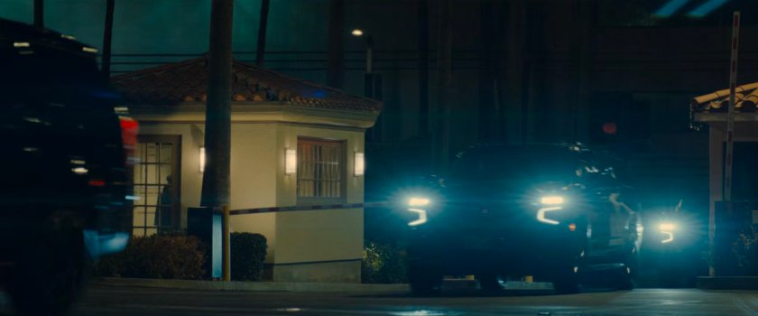 DODC SUVs race onto a Hollywood studio lot.