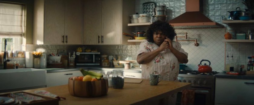 Martha on the phone in the Williams family kitchen.
