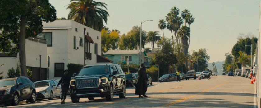 Simon crossing a street to the Wonder Man filming house.