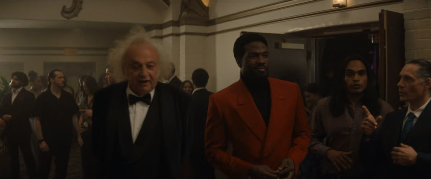 Simon and Von Kovak in the lobby of the movie theater.
