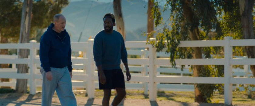 Simon and Chuck jogging on a road in Yucca Valley.