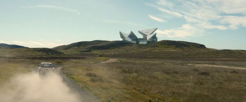 A pickup on a dirt road outside of the DODC Supermax prison facility.