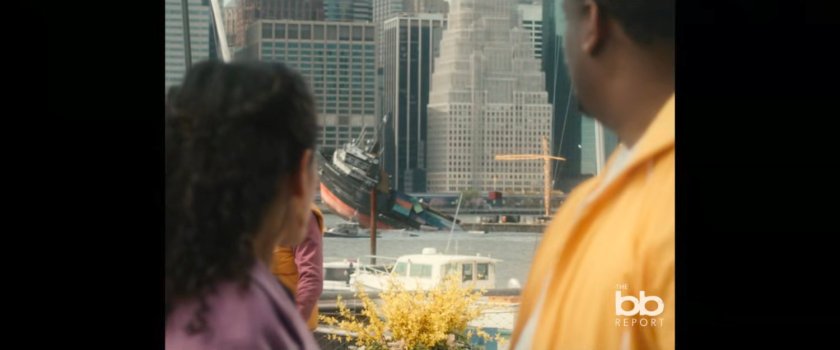 BB Report: couple watching a partially sunk ship in the East River.