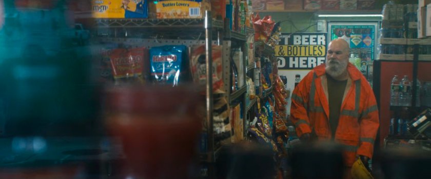A longshoreman in a bodega near the port.