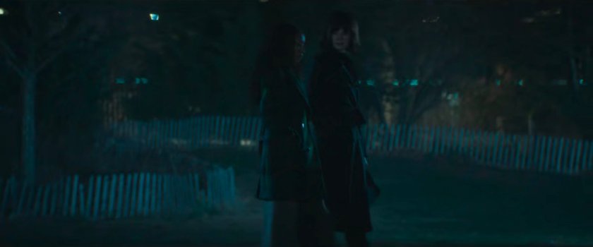 BB and a disguised Karen walk through a dark and foggy park.