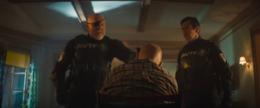 AVTF agents assault Cherry in his apartment.