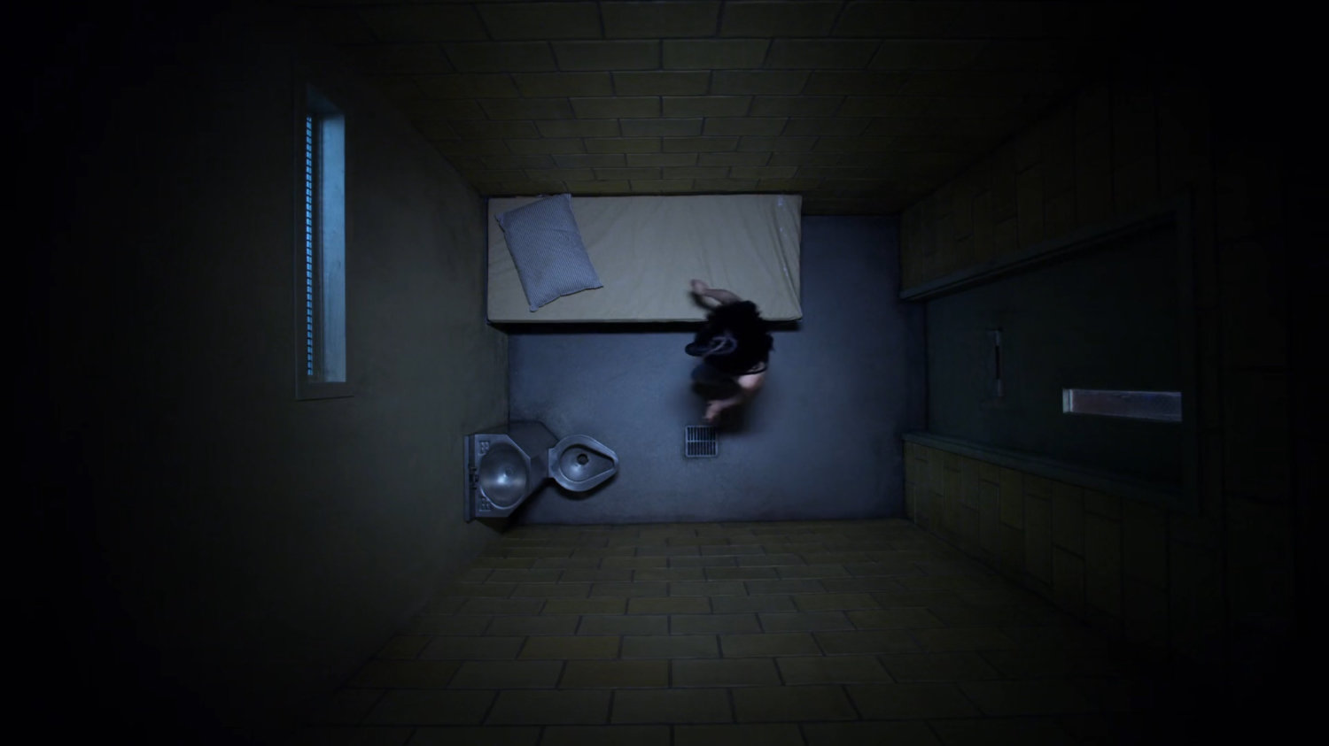 Jessica in the 15th Precinct holding cell.