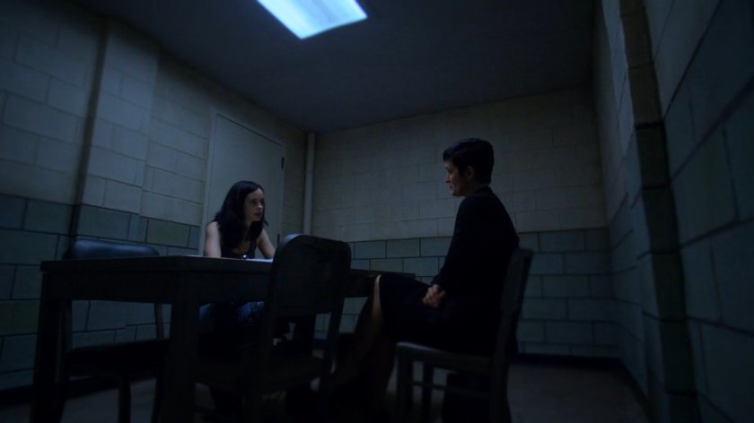Jessica and Jeri in the 15th Precinct interrogation room.