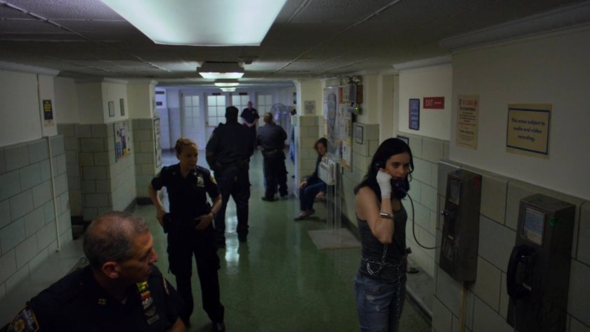 Jessica and officers in the 15th Precinct hallway.