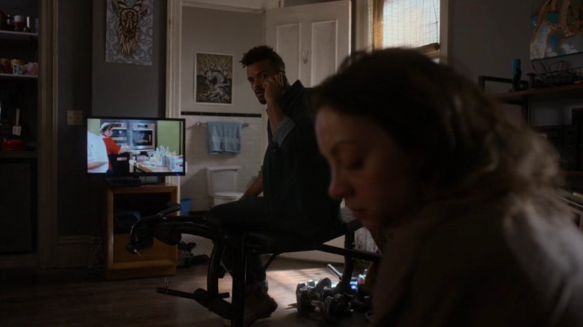 Malcolm and Inez in his apartment.