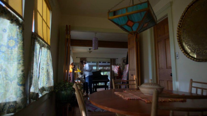 Alisa inside of Karl Malus's house.