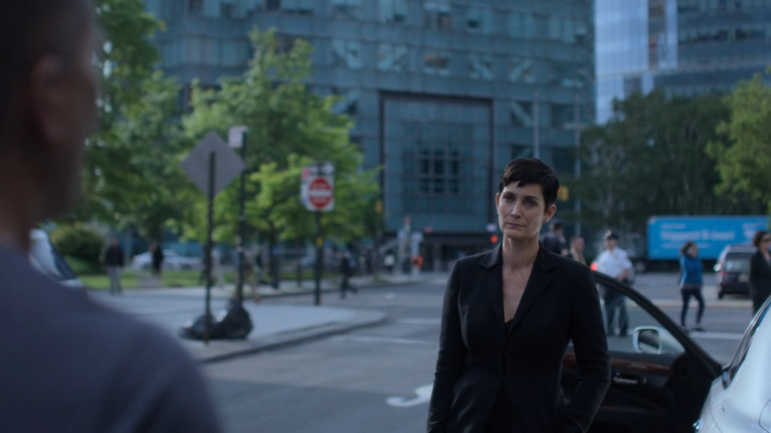 Pryce and Jeri outside the 15th Precinct station.