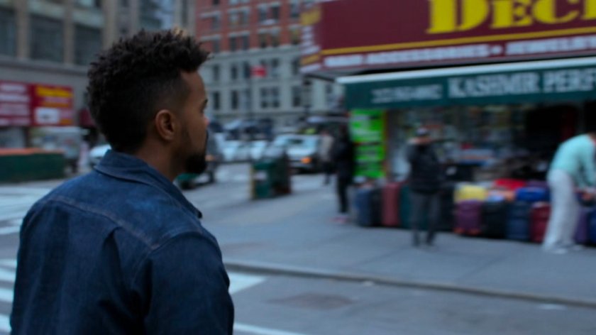 Malcolm crossing a street.