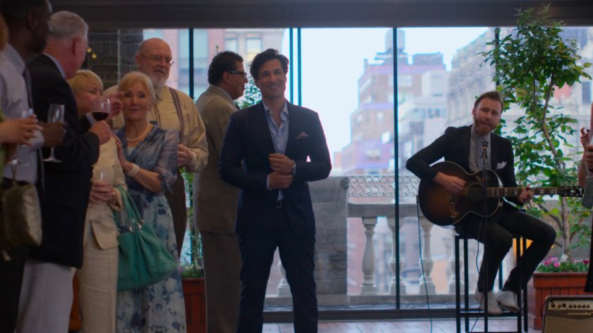 Griffin and relatives inside of a rooftop restaurant.