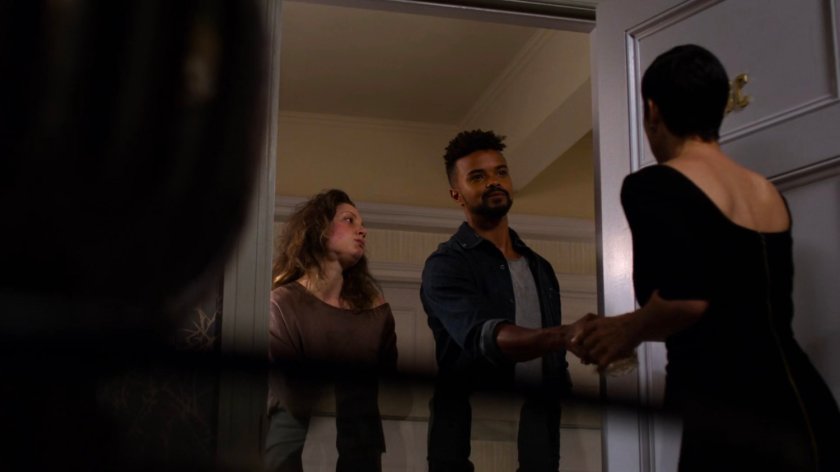 Malcolm and Inez talking with Jeri outside her apartment.