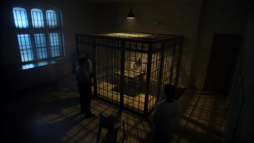 Jessica talking with Dave in a cell of Birch Psychiatric Hospital.