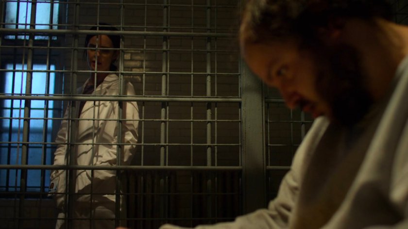 Jessica talking with Dave in a cell of Birch Psychiatric Hospital.