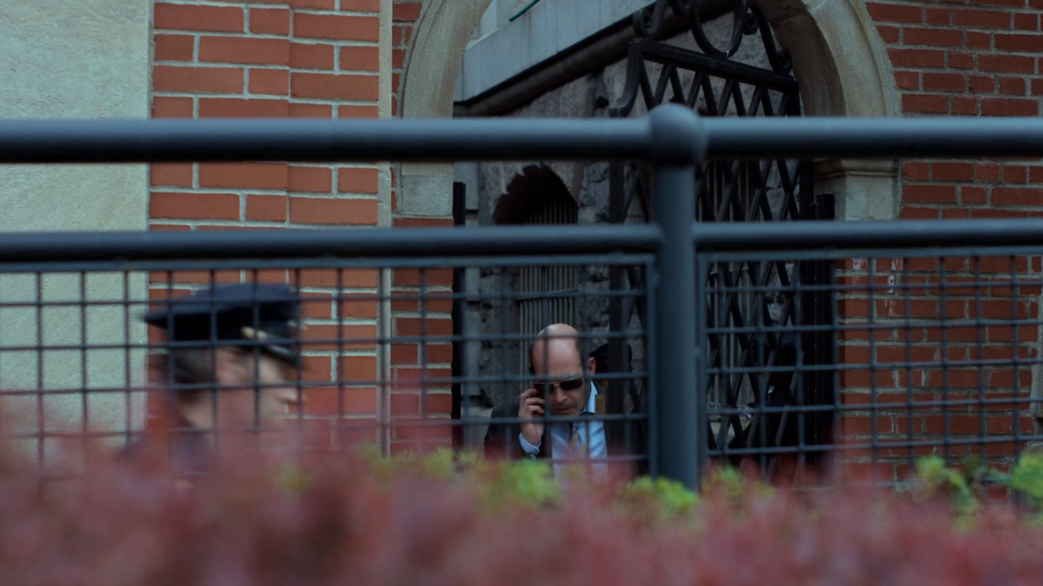 Detective Costa outside the 15th Precinct station.