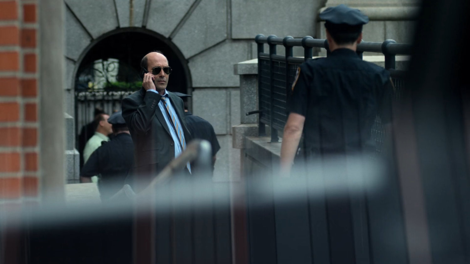 Detective Costa outside the 15th Precinct station.