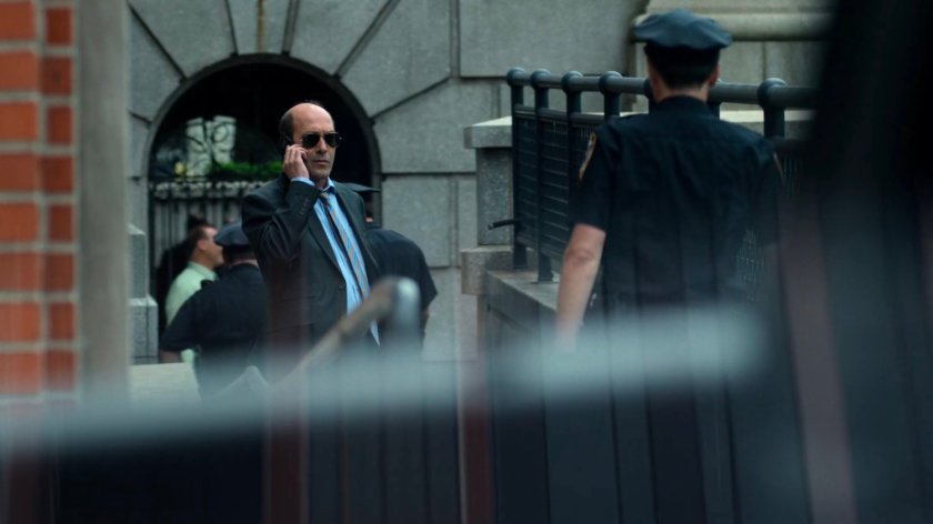 Detective Costa outside the 15th Precinct station.