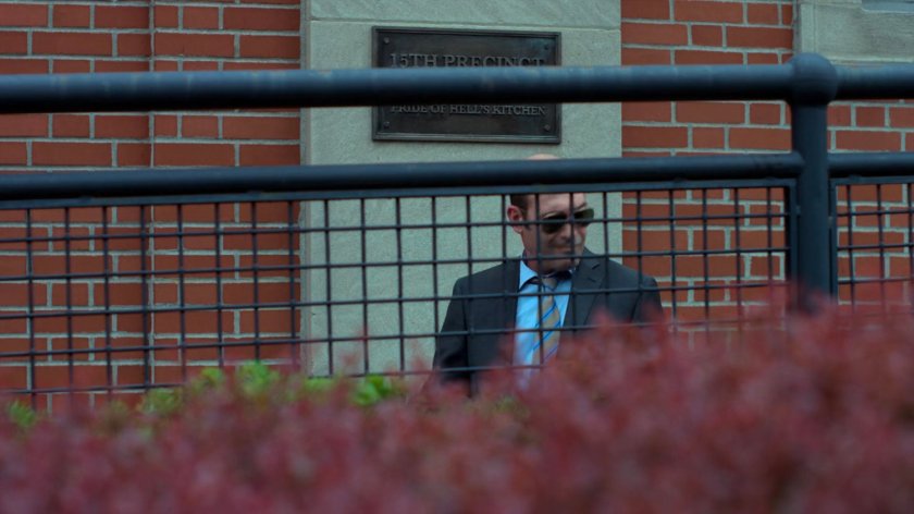 Detective Costa outside the 15th Precinct station.