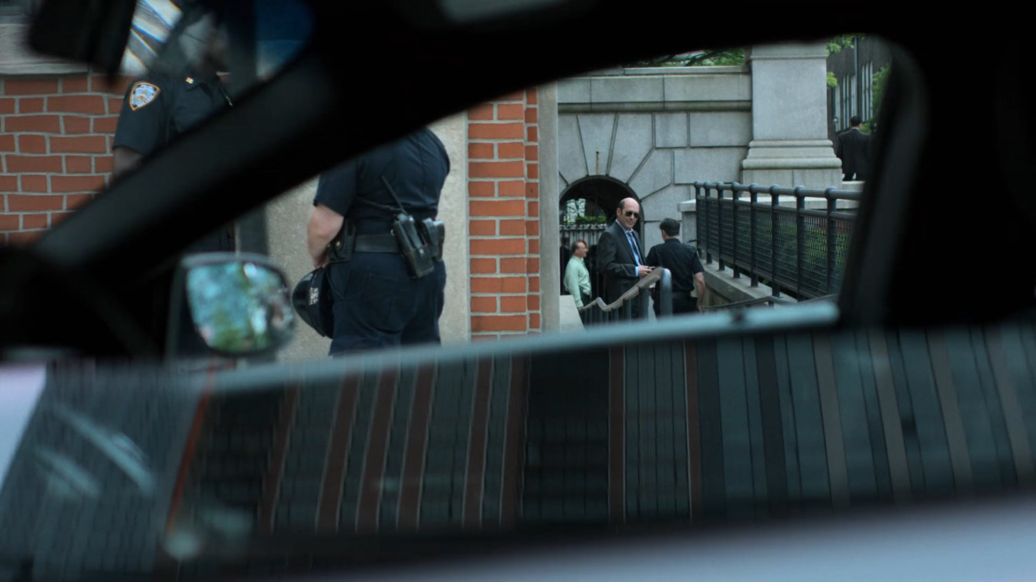 Detective Costa outside the 15th Precinct station.