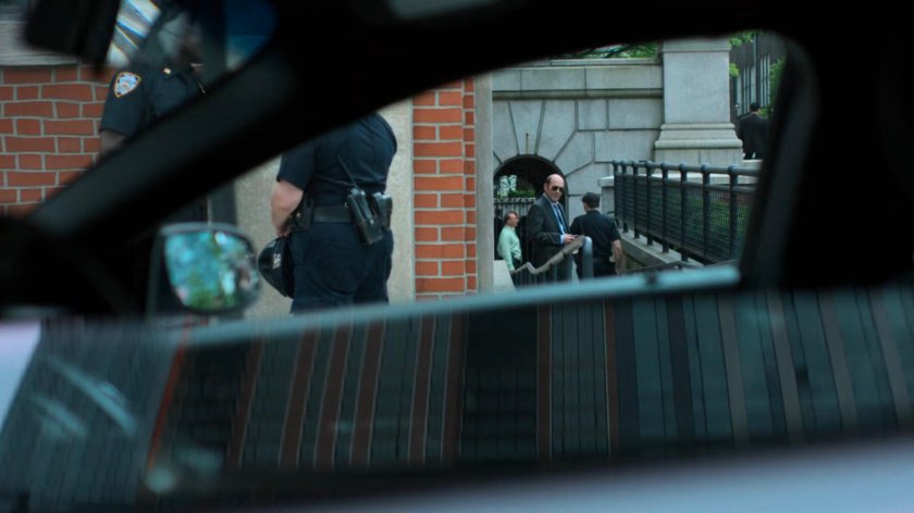 Detective Costa outside the 15th Precinct station.