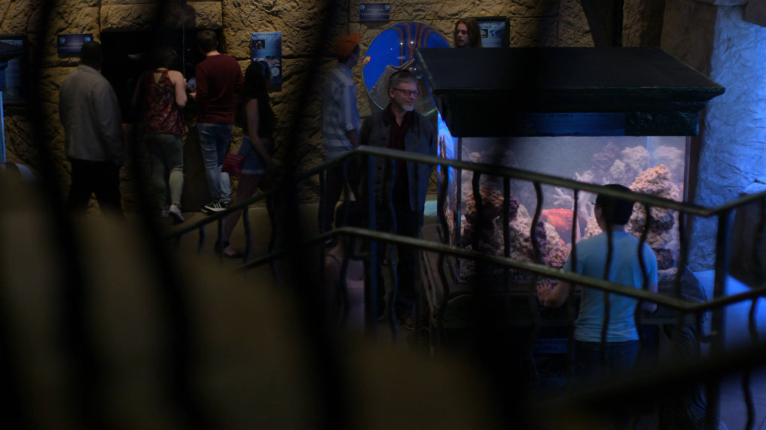 Karl Malus inside of Neptune's World Aquarium.