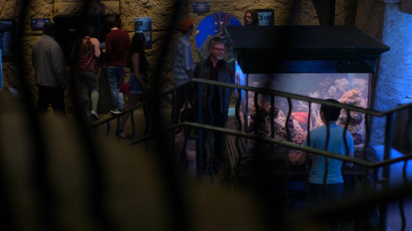 Karl Malus inside of Neptune's World Aquarium.