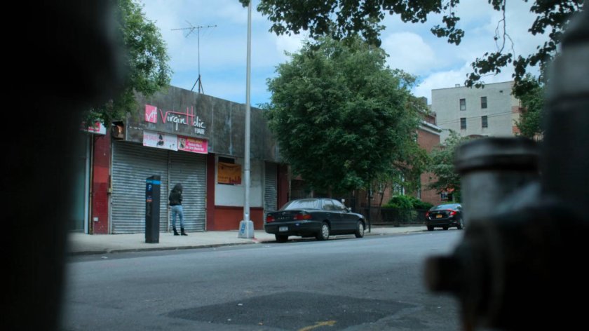 Jessica on a sidewalk near the aquarium.