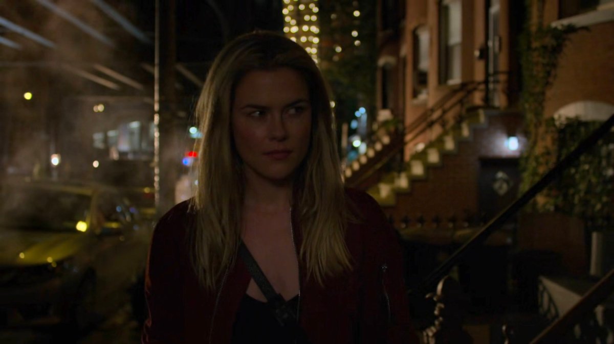 Trish on a sidewalk looking for trouble.