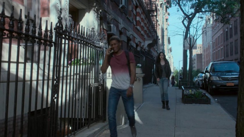 Jessica following Eric outside his apartment building, The Spencer.