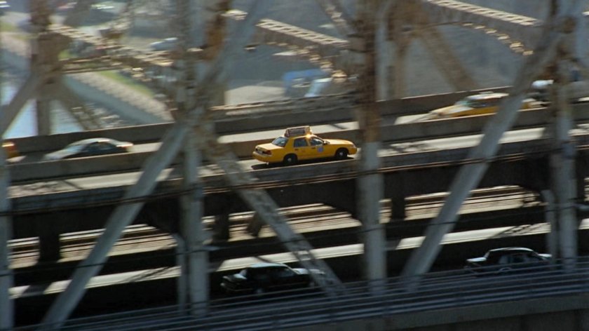 Cab driving along the Queensboro Bridge.
