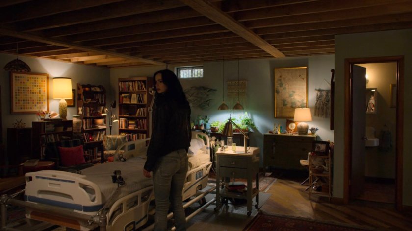 Jessica inside a room in Karl Malus's basement.