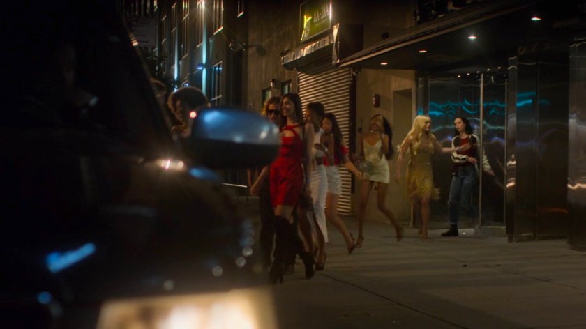 Trish, Jessica, and others exiting a dance club after a party.